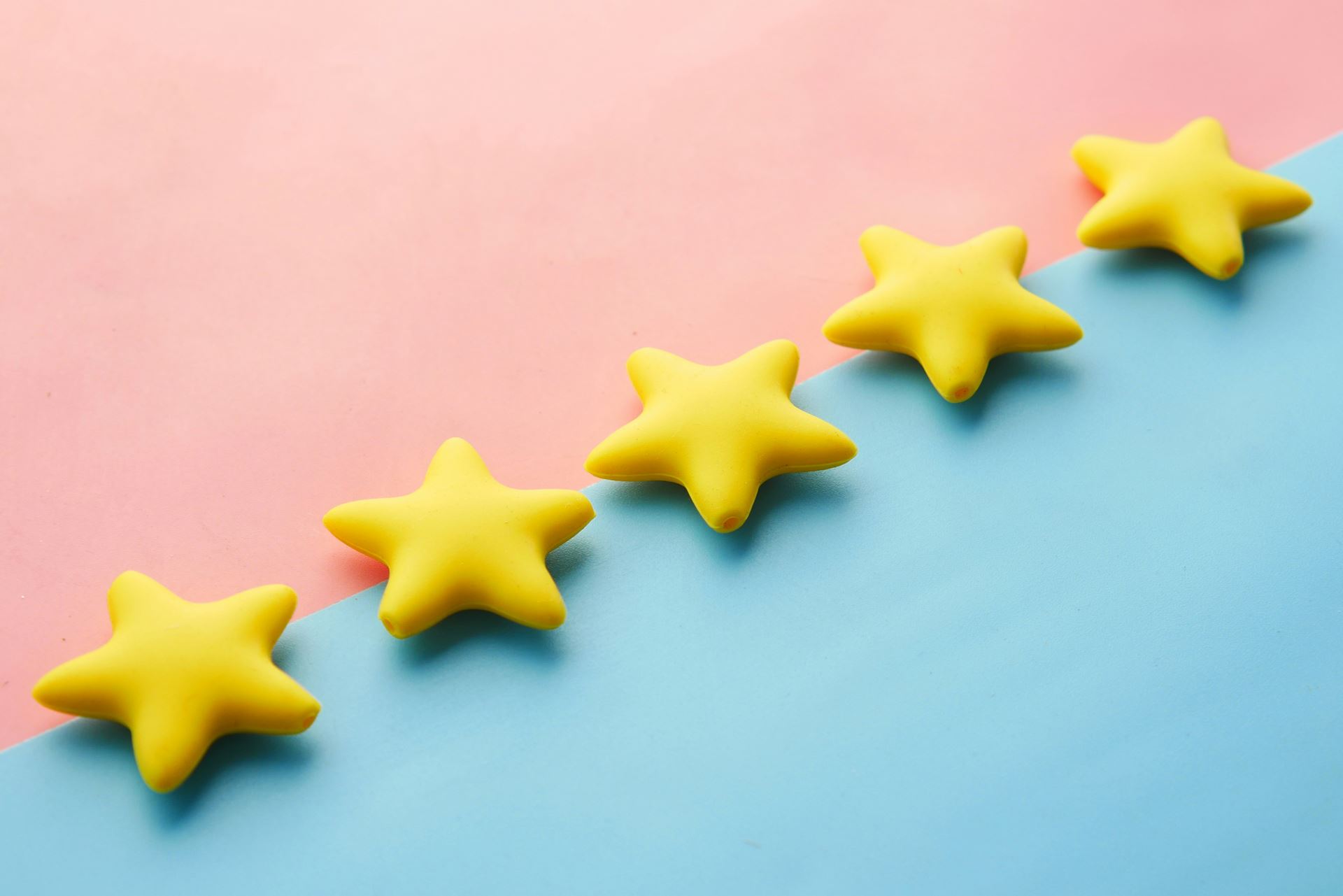 line of stars on blue and pink background
